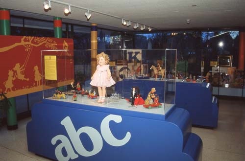 Vintage dolls in a glass display case